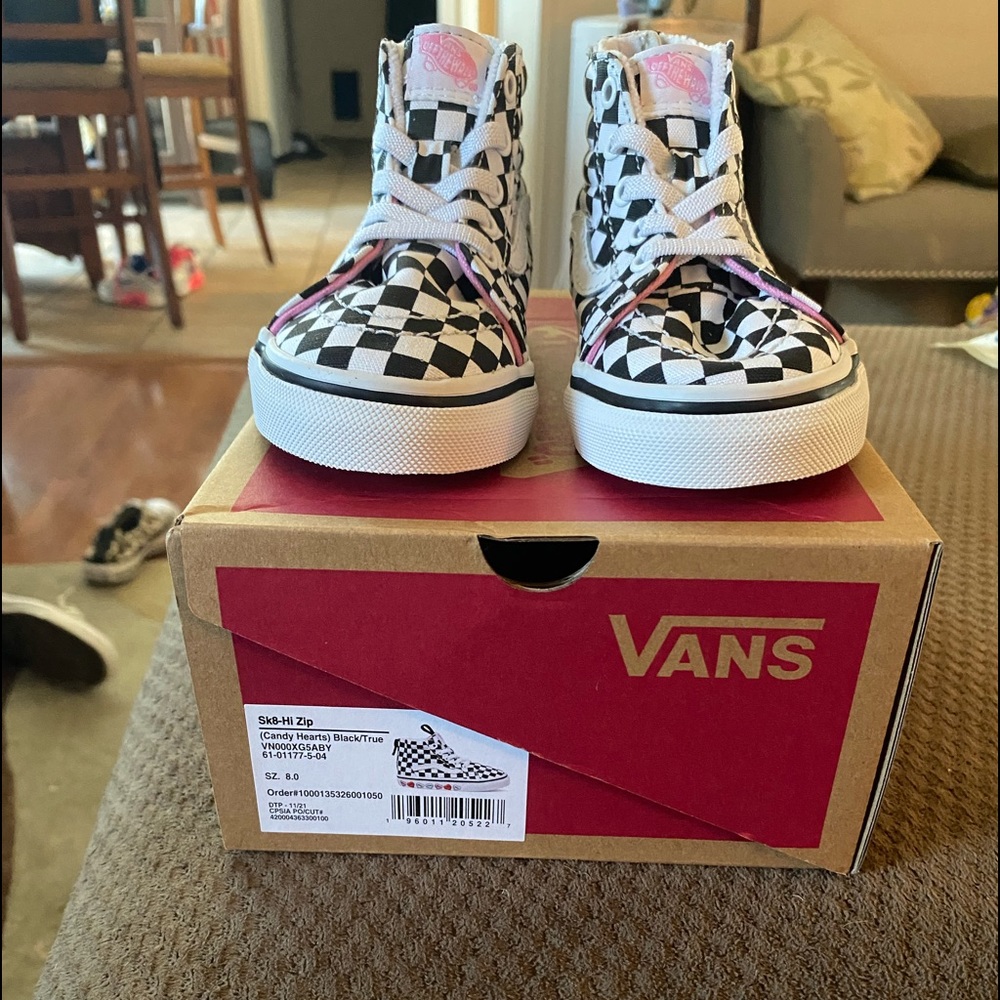 Brand new in the box, never been worn. Toddler size 8 High top Vans!!